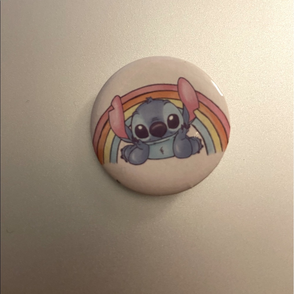 Stitch from lilo and stitch with rainbow pin